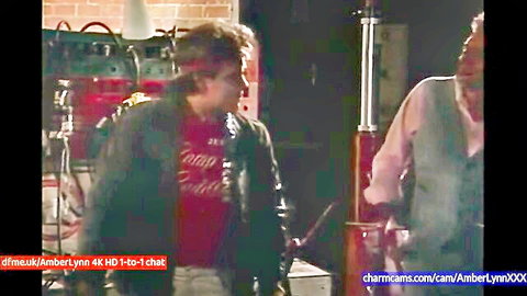 Two clothed men chatting in vintage industrial workshop on Chaturbate webcam