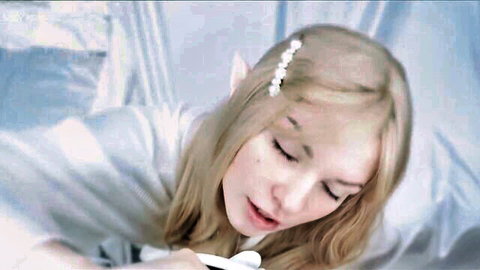 Soly ASMR as teasing elf with blonde hair and elf ears in white lingerie