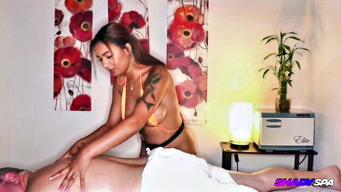 Babi Star in bikini gives steamy handjob massage at shady spa