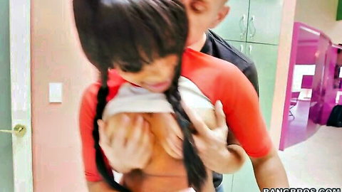 Brunette with big natural tits exposes and squeezes bare breasts while boyfriend gropes her from behind