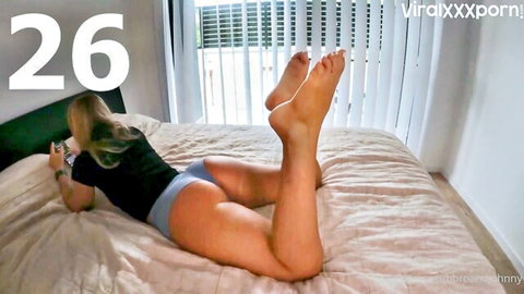 Holly Brougham blonde tease showing ass and bare feet in bed