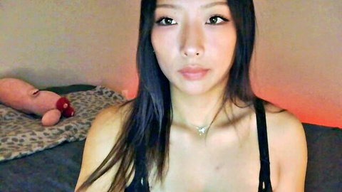 Vivianwinters teasing in low-cut black top with deep cleavage, long black hair