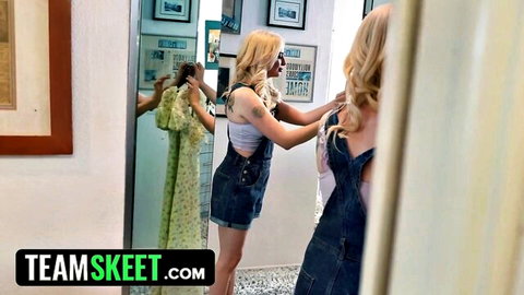 Blonde babe in tiny denim shorts exposing juicy ass cheeks in dressing room mirror