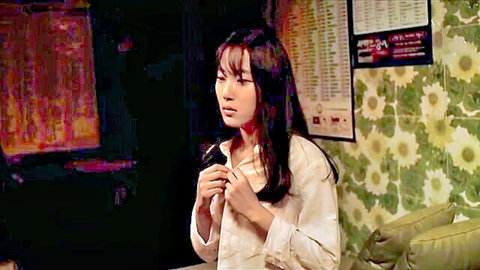 Korean tutor unbuttoning white blouse, long dark hair, teasing pose