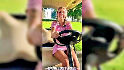 Young blonde babe in tiny pink skirt and tight white top smiling while driving golf cart