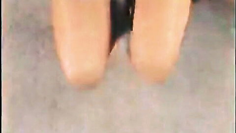 Busty brunette POV close-up of thighs in black stockings and heels