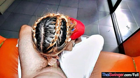 Amateur Thai MILF with braided hair in blowjob pose on camera