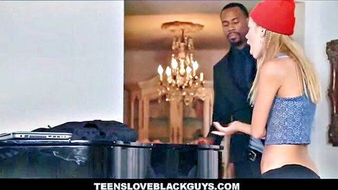 Petite blonde teen bends over showing tight ass to black guy in luxury room
