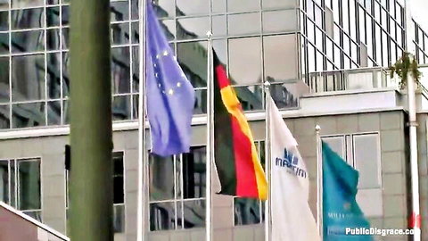 Angelica Heart public humiliation outdoor scene with flags