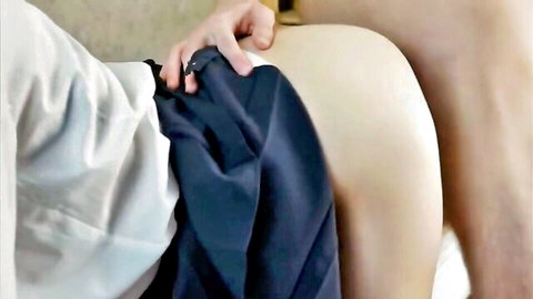 Hand spreading pale naked ass cheek exposing tight pink hole closeup