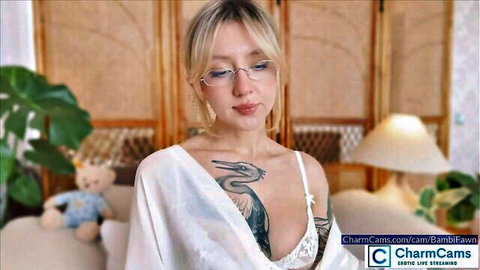 BambiFawn in sheer lingerie teasing with dragon tattoo on chest