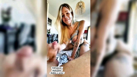 Blonde trans woman in lingerie giving deepthroat blowjob