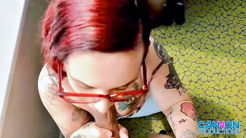 Santana Red tattooed redhead giving blowjob in Cannon Productions