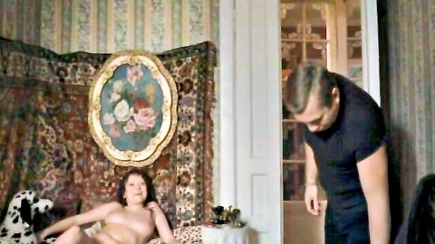 Anna Koroteeva nude reclining on bed with standing man in Kochegar