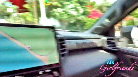 POV car dashboard with GPS at red light during boyfriend girlfriend car adventure