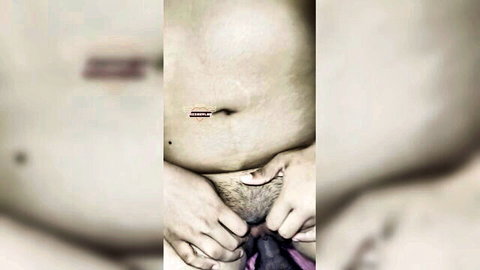 Hands spreading open hairy pussy lips with thick dark dildo penetrating wet vagina