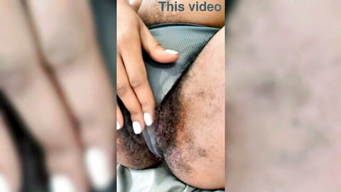 Hand pulls gray panties aside exposing hairy pussy and asshole closeup
