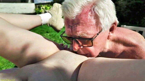 Old man in sunglasses licks young woman's shaved pussy outdoors during intense cunnilingus