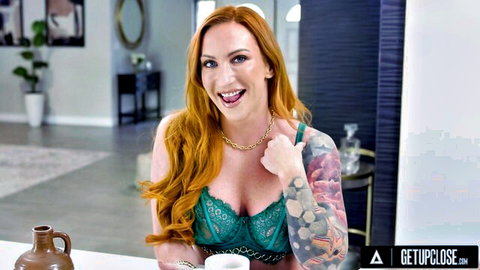 Sophia Locke redhead cougar in green lace lingerie smiling seductively