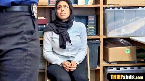 Hijab Muslim teen thief cuffed in interrogation by cop