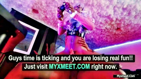 Sexy e-girl gamer teases huge tits in strappy harness under pink neon lights holding controller