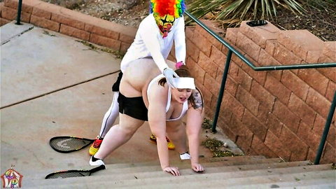 BBW with huge tits and fat ass in tight shorts on all fours as clown grabs her hips outdoors