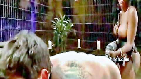 Ebony mistress with huge tits leashes tattooed white slave boy in BDSM scene
