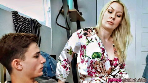 Blonde MILF stepmom exposes huge bare tits to young stepson in bedroom
