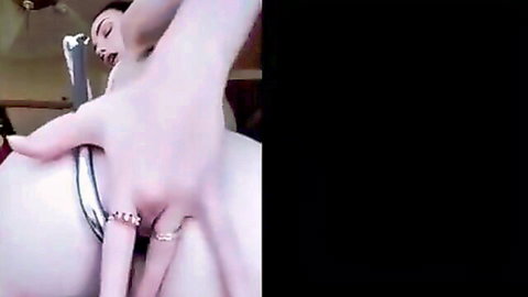 Hot BDSM woman in face mask testing anal hook insertion solo