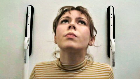 Anna Viktorsson looking up sensually in striped turtleneck, hot celeb tease