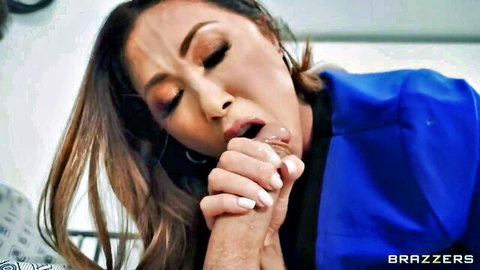 Asian brunette nurse babe slurping huge cock with tight hand grip and open mouth