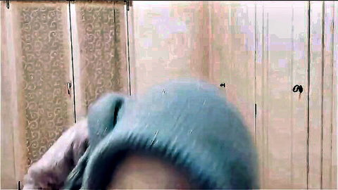 Mystery woman in green hat performs oral spell activation in steamy locker room