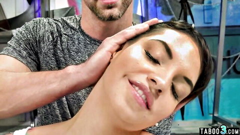 Hispanic woman smiles as man holds her head in intimate anal training scene
