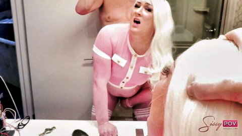Blonde in tight pink romper squats moaning as muscular man grabs her from behind in steamy bathroom