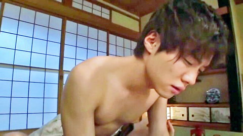 Young Asian man topless, kneeling pose in JAV scene