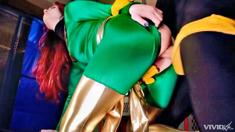 Redhead in green latex costume fucked doggy style by boyfriend