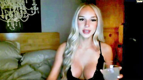 Sadie Blake blonde bombshell in black lace lingerie sipping drink solo cam