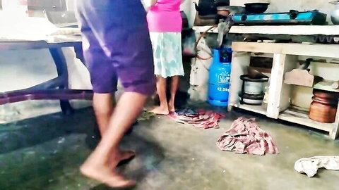 Shshavin in pink top and green skirt teasing with partner in amateur kitchen scene