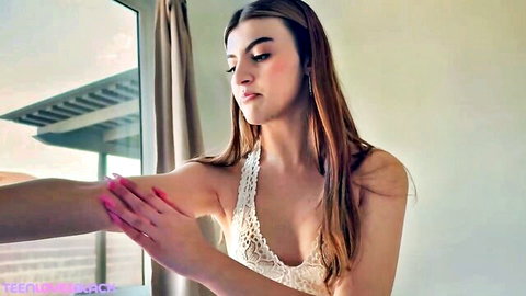 Julia James in sexy white lace lingerie, teasing pose