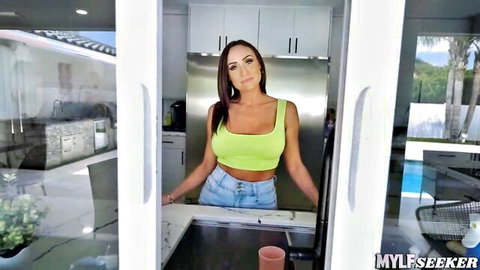 Alyssia Vera in green tank top and denim shorts, busty MILF tease