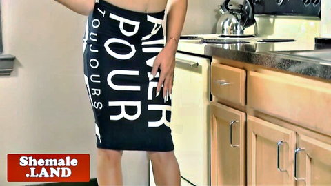 Youthful ebony shemale in tight black skirt teasing solo