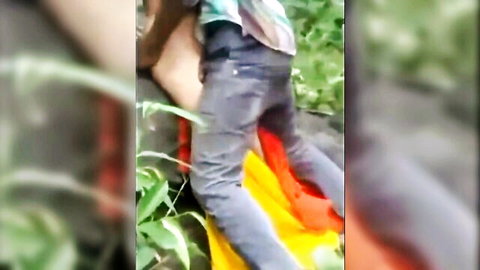 Indian couple passionate outdoor sex in lush greenery, amateur style