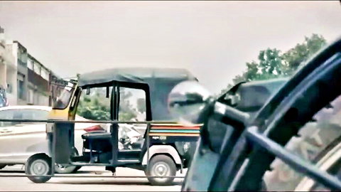 Street scene with yellow auto-rickshaw and urban background, Antique web series thumbnail