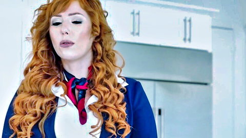 Lauren Phillips redhead milf in sexy flight attendant uniform