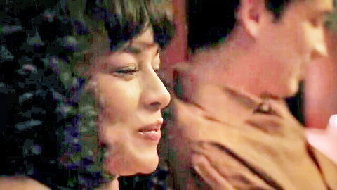 Estefania Pineres profile with man in intimate Delirium 2025 nude scene