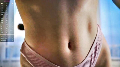 Slim young webcam babe teases shaved pussy mound in low pink ribbed panties