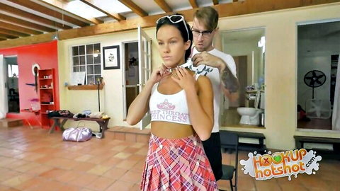 Megan Rain in plaid skirt and crop top during steamy HookupHotshot casting