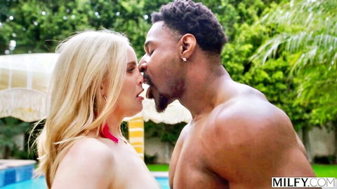 Blonde MILF Charlie Forde kisses muscular Jax Slayher poolside