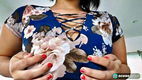Emori Pleezer squeezing her big tits in lacy floral dress