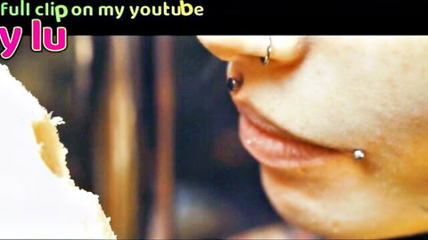Anuskatzz close-up lips with piercings in teasing banana ASMR thumbnail
